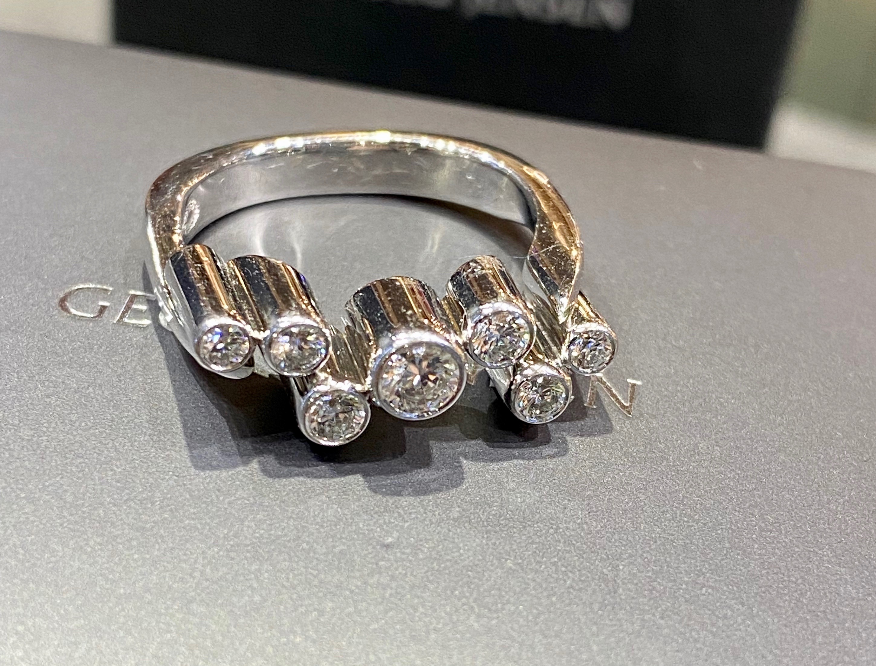 Discover the White Gold Cascade Diamond Ring by Georg Jensen at Grasilver. A luxurious design with stunning diamonds, perfect for adding elegance to any look.